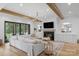Spacious living room with a fireplace, built-in cabinets, and access to the outdoors at 2165 Country Club Rd, Lincolnton, NC 28092