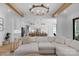 Spacious living room with an open-concept design, view of the kitchen, and stylish furnishings at 2165 Country Club Rd, Lincolnton, NC 28092