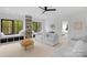 Bright living room featuring built-in window seating and open access to another room at 2165 Country Club Rd, Lincolnton, NC 28092