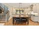 Kitchen with an island bar, modern lighting, and stainless steel appliances at 2229 Kenmore Ave, Charlotte, NC 28204