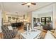 Inviting living room flowing into spacious kitchen with a large island and stainless steel appliances at 2229 Kenmore Ave, Charlotte, NC 28204