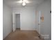 Bedroom featuring carpeted floors and white walls with a closet at 234 Olin Loop, Olin, NC 28660