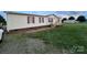 Charming single-Gathering home with vinyl siding and well-maintained lawn at 234 Olin Loop, Olin, NC 28660