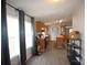 Bright kitchen with an island, dark appliances, and laminate flooring at 234 Olin Loop, Olin, NC 28660