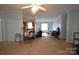Open-concept living room, providing ample space for furniture and decor at 234 Olin Loop, Olin, NC 28660