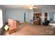Bright and airy living room with neutral-toned walls at 234 Olin Loop, Olin, NC 28660