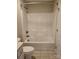 Clean bathroom featuring a shower-tub combination with white tile and neutral walls at 2355 Villa Oaks Ct, Gastonia, NC 28054