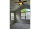 Bedroom featuring neutral carpet, large windows with blinds and ceiling fan at 2355 Villa Oaks Ct, Gastonia, NC 28054