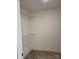 Walk in closet with metal shelving and carpet floors at 2355 Villa Oaks Ct, Gastonia, NC 28054