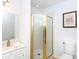 Well-maintained bathroom featuring a shower enclosure, vanity and toilet at 2504 Stradbrook Dr # B, Charlotte, NC 28210
