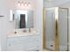 Clean bathroom with a shower enclosure, a sink with a vanity and a large mirror at 2504 Stradbrook Dr # B, Charlotte, NC 28210