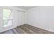 Bright bedroom offers ample natural light, neutral walls, and generous closet space for easy organization at 2504 Stradbrook Dr # B, Charlotte, NC 28210