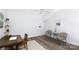 Bright home office features vaulted ceilings and is set up with a charming seating area and a writing desk at 2504 Stradbrook Dr # B, Charlotte, NC 28210