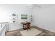Bright home office boasts natural light, vaulted ceilings, and ample display shelving for work or study at 2504 Stradbrook Dr # B, Charlotte, NC 28210