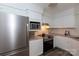 Well-maintained kitchen featuring stainless steel appliances, ample cabinet space, and modern countertops at 2504 Stradbrook Dr # B, Charlotte, NC 28210