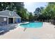 Inviting community pool area with lounge chairs and a covered pavilion at 2504 Stradbrook Dr # B, Charlotte, NC 28210