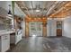 Spacious kitchen area features white cabinets, double doors to the outside, and an open design at 2701 N Sharon Amity Rd, Charlotte, NC 28205