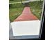 Inviting wooden walkway leading to the house, offering a warm and natural welcome at 2701 N Sharon Amity Rd, Charlotte, NC 28205