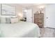 Comfortable bedroom with closet and stylish wooden dresser at 315 N Kimmons St, Landis, NC 28088