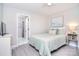 Light filled bedroom includes ensuite bathroom and coastal decor at 315 N Kimmons St, Landis, NC 28088