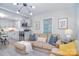 Open-concept living room flows into the kitchen, showcasing modern finishes and natural light at 315 N Kimmons St, Landis, NC 28088