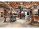 Spacious basement with spiral staircase and exposed ductwork, perfect for workshop or entertainment area at 32060A Flint Ridge Rd, Albemarle, NC 28001