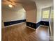 Bedroom with chair railing, providing an elegant division between the upper and lower walls at 32060A Flint Ridge Rd, Albemarle, NC 28001