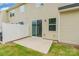 A small backyard featuring a concrete patio and siding on the back of the house at 3832 Amalia Pl, Indian Land, SC 29707