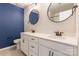 Bathroom with dual sinks, round mirrors, and stylish design at 3832 Amalia Pl, Indian Land, SC 29707