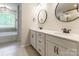 Bathroom featuring a white double sink vanity with bronze fixtures at 3832 Amalia Pl, Indian Land, SC 29707