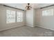 Bedroom with natural light and stylish ceiling light at 3832 Amalia Pl, Indian Land, SC 29707