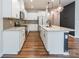 Contemporary kitchen with white cabinetry, granite countertops, and stainless steel appliances at 3832 Amalia Pl, Indian Land, SC 29707