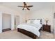 Spacious bedroom with a ceiling fan, neutral carpet, and abundant natural light at 4019 Channel Islands Way, Lancaster, SC 29720