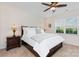 Cozy bedroom with a ceiling fan, neutral carpet, and abundant natural light at 4019 Channel Islands Way, Lancaster, SC 29720
