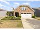 Charming single-Gathering home featuring a stone facade and well-maintained landscaping at 4019 Channel Islands Way, Lancaster, SC 29720