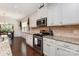 Gourmet kitchen with stainless steel oven and range, and granite countertops at 4019 Channel Islands Way, Lancaster, SC 29720