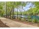 Scenic lakefront with canoes and docks offers a picturesque setting for water activities at 4019 Channel Islands Way, Lancaster, SC 29720