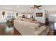 Open-concept living room flowing into the kitchen and dining area, with hardwood floors at 4019 Channel Islands Way, Lancaster, SC 29720