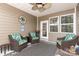 Cozy screened patio featuring wicker furniture, a ceiling fan, and a view to the backyard at 4019 Channel Islands Way, Lancaster, SC 29720