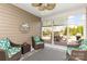 Beautiful patio with a ceiling fan, cozy seating, and a clear view to the patio and backyard at 4019 Channel Islands Way, Lancaster, SC 29720