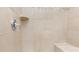 Close-up of a tiled shower with a built-in seat and shampoo shelf, complete with a chrome shower handle at 4019 Channel Islands Way, Lancaster, SC 29720