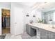 Main bathroom featuring double sink vanity, and access to a walk-in closet at 407 Goodloe Dr, Charlotte, NC 28262