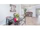 Bright office with stylish black desk, modern art, and decorative plants and cabinets at 407 Goodloe Dr, Charlotte, NC 28262