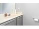 Clean powder room featuring a large mirror, vanity sink and neutral color palette at 407 Goodloe Dr, Charlotte, NC 28262