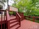 Wooden back deck perfect for outdoor relaxation with canopy at 5412 Crosshill Ct, Charlotte, NC 28277