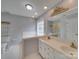 Bright, tiled bathroom featuring double sinks, a large mirror and tub at 5412 Crosshill Ct, Charlotte, NC 28277