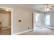Bedroom with doorway to bathroom, and doorway to hallway and other rooms at 5412 Crosshill Ct, Charlotte, NC 28277