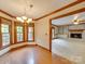 Formal dining room featuring hardwood floors and decorative wood trim at 5412 Crosshill Ct, Charlotte, NC 28277