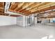 Spacious unfinished basement with exposed wood framing and ductwork at 5520 Chestnut Dr, Hickory, NC 28602