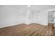 Bedroom with hardwood floors, large closet, and access to renovated bathroom at 5520 Chestnut Dr, Hickory, NC 28602